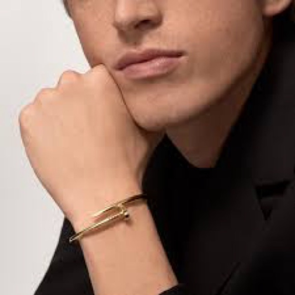 Nail stainless steel bracelet for men .